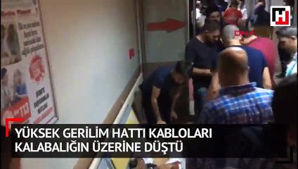 Yüksek gerilim hattı kabloları kalabalığın üzerine düştü