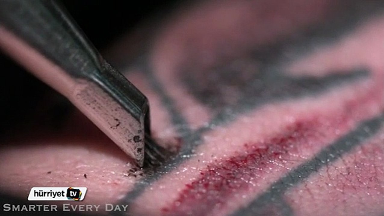 Yavaş çekimde dövme sanatı