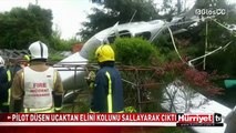 PİLOT DÜŞEN UÇAKTAN ELİNİ KOLUNU SALLAYARAK ÇIKTI