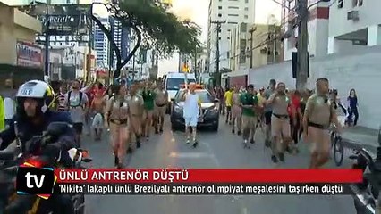 Ünlü antrenör olimpiyat meşalesini taşırken düştü