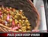 POLİS ŞEKER VERİP, UYARDI