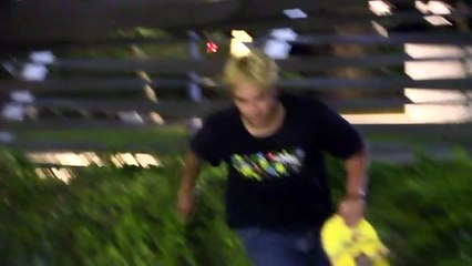 Skateboarder does 360 flip from set of stairs and lands on back of head