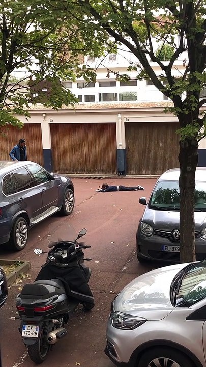 Skateboarder rides in driveway then skateboard accidentally hits boy on his face