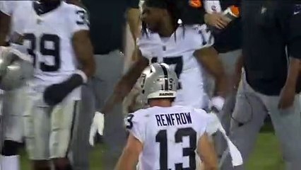 After the game, Davante Adams throws his helmet and shoves the cameraman.