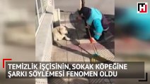 Temizlik işçisinin, sokak köpeğine şarkı söylemesi fenomen oldu