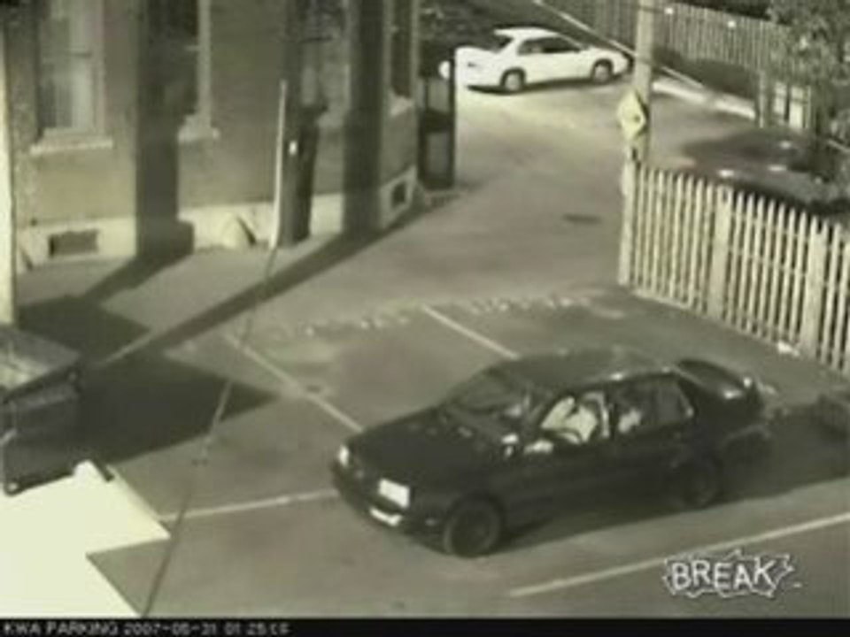 Woman Pulling Out of Parking Lot
