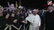 Disgruntled Pope Francis pulls himself free from woman's grasp