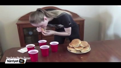 16 dakikada 20 hamburger yedi