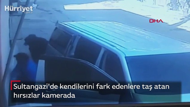 Kendilerini fark edenlere taş atan hırsızlar kamerada