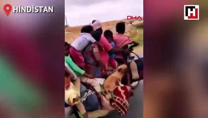 7 kişi, 2 köpek ve eşyalar aynı motosiklette...