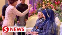 Chinese couple in JB celebrate their union with Malay tradition