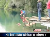SU ÜSTÜNDE GİDEN BİSİKLET