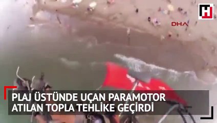 Plaj üstünde uçan paramotor, atılan topla tehlike geçirdi