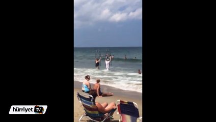 Köpek balıklarından korunmak için...