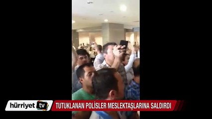 Tutuklanan polisler meslektaşlarına saldırdı