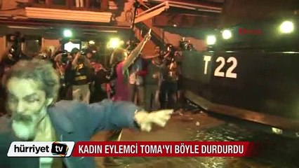 Kadın eylemci TOMA'yı böyle durdurdu