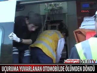 UÇURUMA YUVARLANAN OTOMOBİLDE ÖLÜMDEN DÖNDÜ
