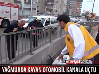 YAĞMURDA KAYAN OTOMOBİL KANALA UÇTU