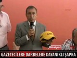 GAZETECİLERE 'DAYAĞA' DAYANIKLI ŞAPKA