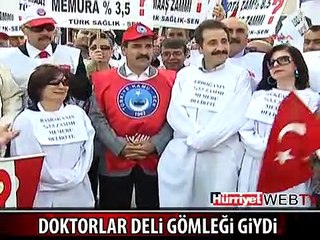 DOKTORLAR DELİ GÖMLEĞİ GİYDİ
