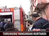 ÖLÜMÜ GÖZE ALARAK TORUNUNU KURTARDI