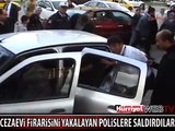 CEZAEVİ FİRARİSİNİ YAKALAYAN POLİSLERE SALDIRDILAR