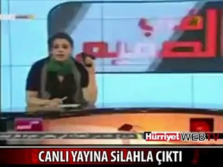 CANLI YAYINA SİLAHLA ÇIKTI