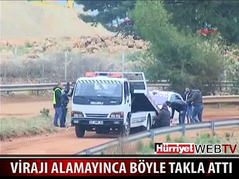 OTOMOBİL PİSTTE TAKLA ATTI
