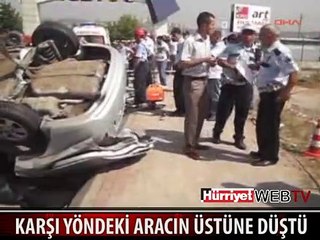 AŞIRI HIZLI OTOMOBİL KARŞI YÖNDEKİ ARACIN ÜSTÜNE DÜŞTÜ