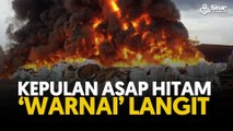 Kepulan asap hitam 'warnai' langit