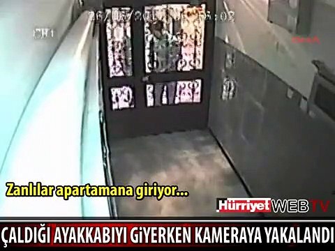 ÇALDIĞI AYAKKABIYI GİYERKEN KAMERAYA YAKALANDI