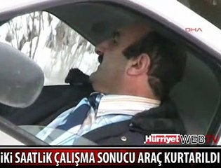 OTOMOBİL DUVARDA ASILI KALDI