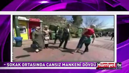 CANSIZ MANKENİ YERE YATIRIP DÖVDÜ