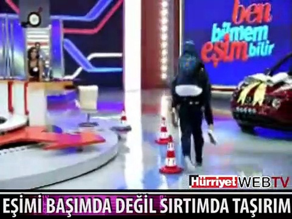 BEN EŞİMİ BAŞIMDA DEĞİL SIRTIMDA TAŞIRIM
