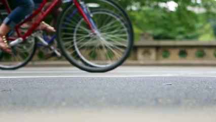 Bikers and Carriages Driving on Street.mp4