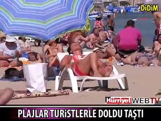 TURİSTLER PLAJLARA AKIN ETTİ