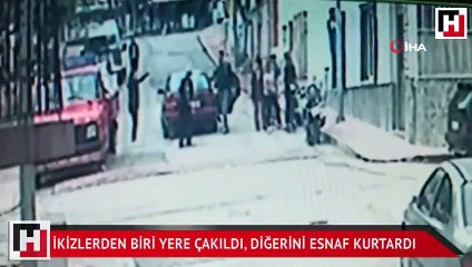 İkizlerden biri yere çakıldı, diğerini esnaf kurtardı