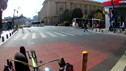 Speedy Bicyclist Can't Stop Hitting the Side of a Bus