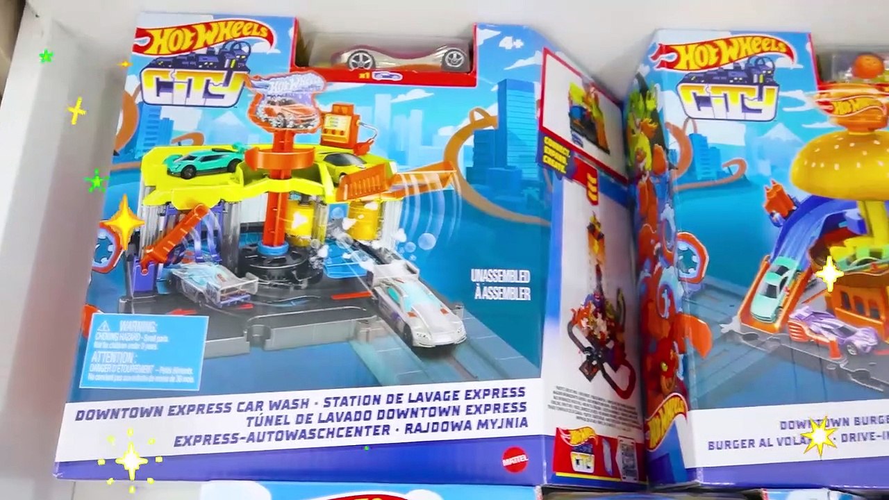 Chris plays with Hot Wheels cars and builds Hot Wheels City