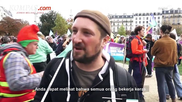 Thousands of French take to the streets to protest against rising inflation and climate crisis