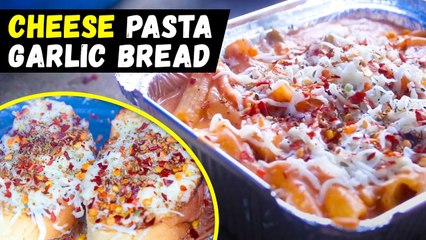 Descargar video: Mix Sauce Pasta With Cheese - Garlic Bread - Indian Style Cheese Pasta Recipe