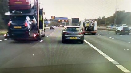 Driver makes last-minute dart across Manchester motorway