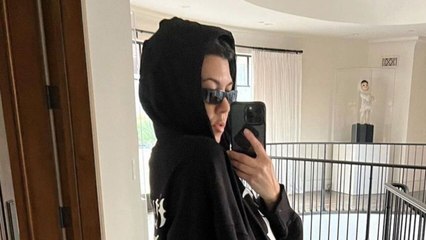 Kourtney Kardashian Paired a Butt-Baring Netted Skirt with Blink-182 Merch