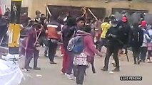 Indigenous protesters and riot police clash in Bogota