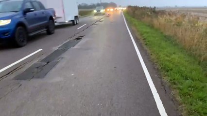 Motorist shows the crumbling Hulls Drove near Crowland