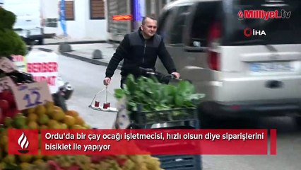 Bu da iki tekerli çaycı... Servisleri hızlı olsun diye bisikletle yapıyor