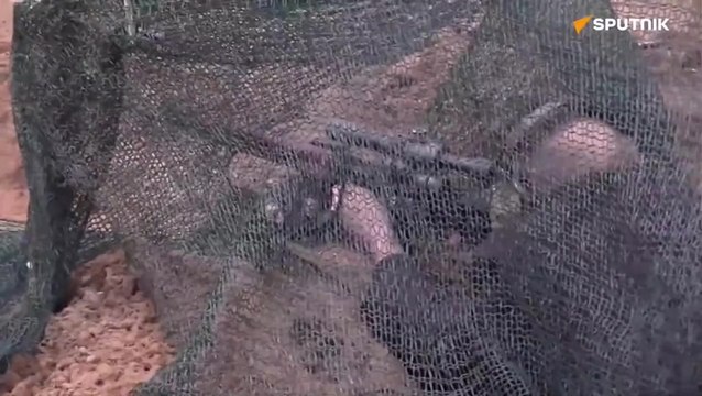 Putin fires sniper rifle as he inspects Russian mobilised reservists