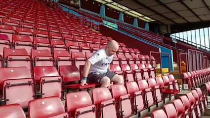 Football fan spends 35 hours sitting on every seat at Villa Park for charity