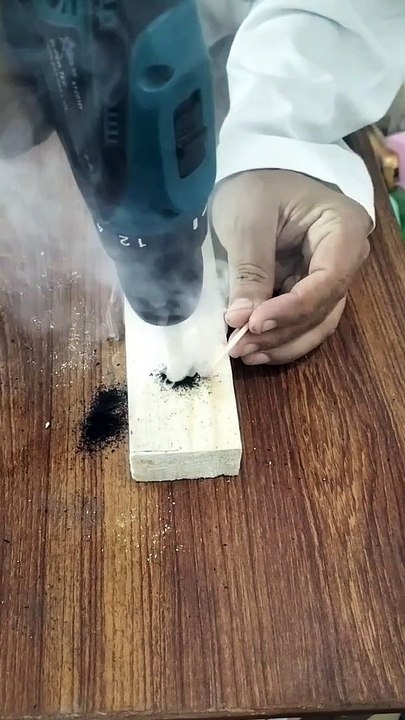 Experiment drill machine and wood.