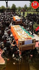 Body wraped into three different flags